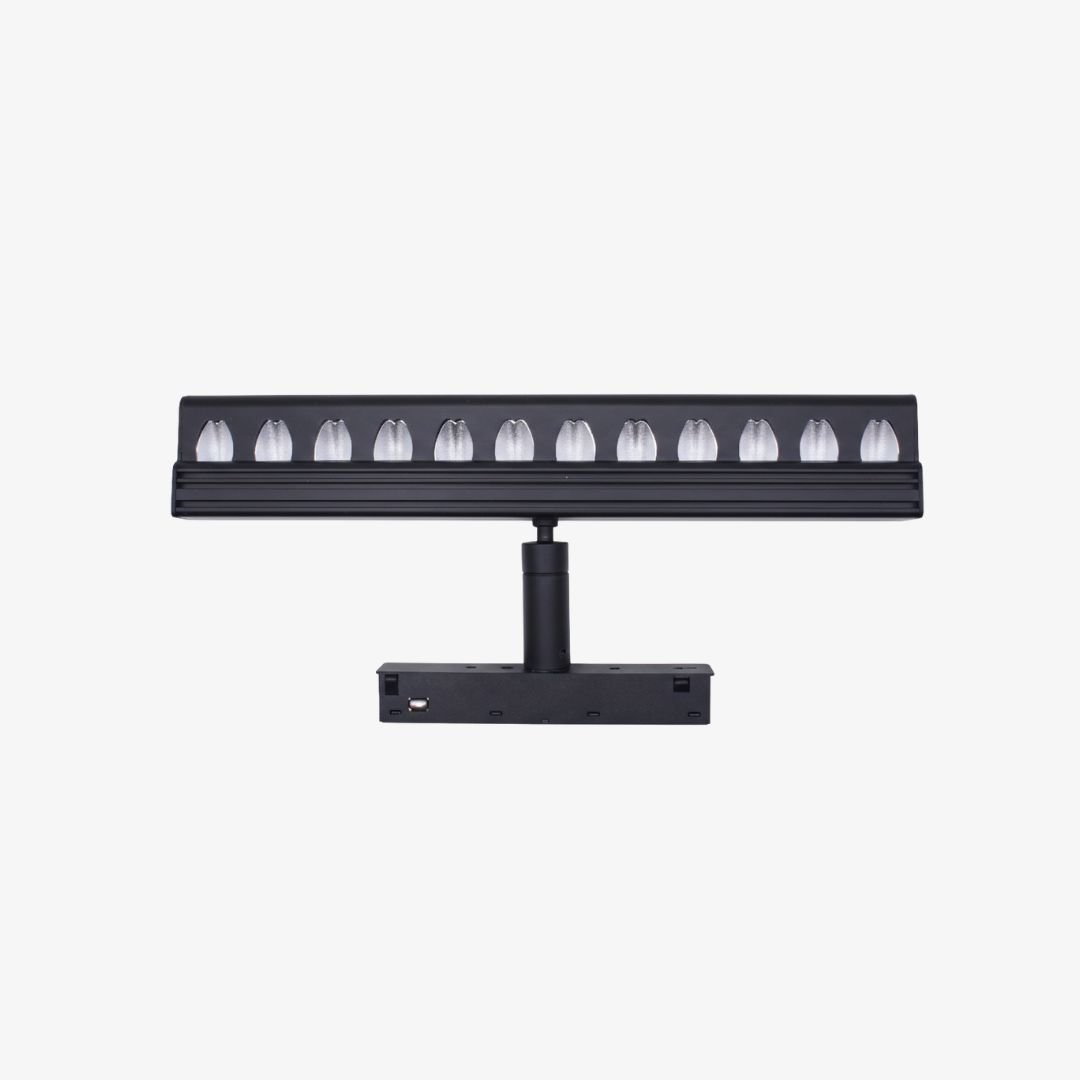 Linea Grille Adjustable 48V magnetic LED light with adjustable black housing and recessed optical lenses