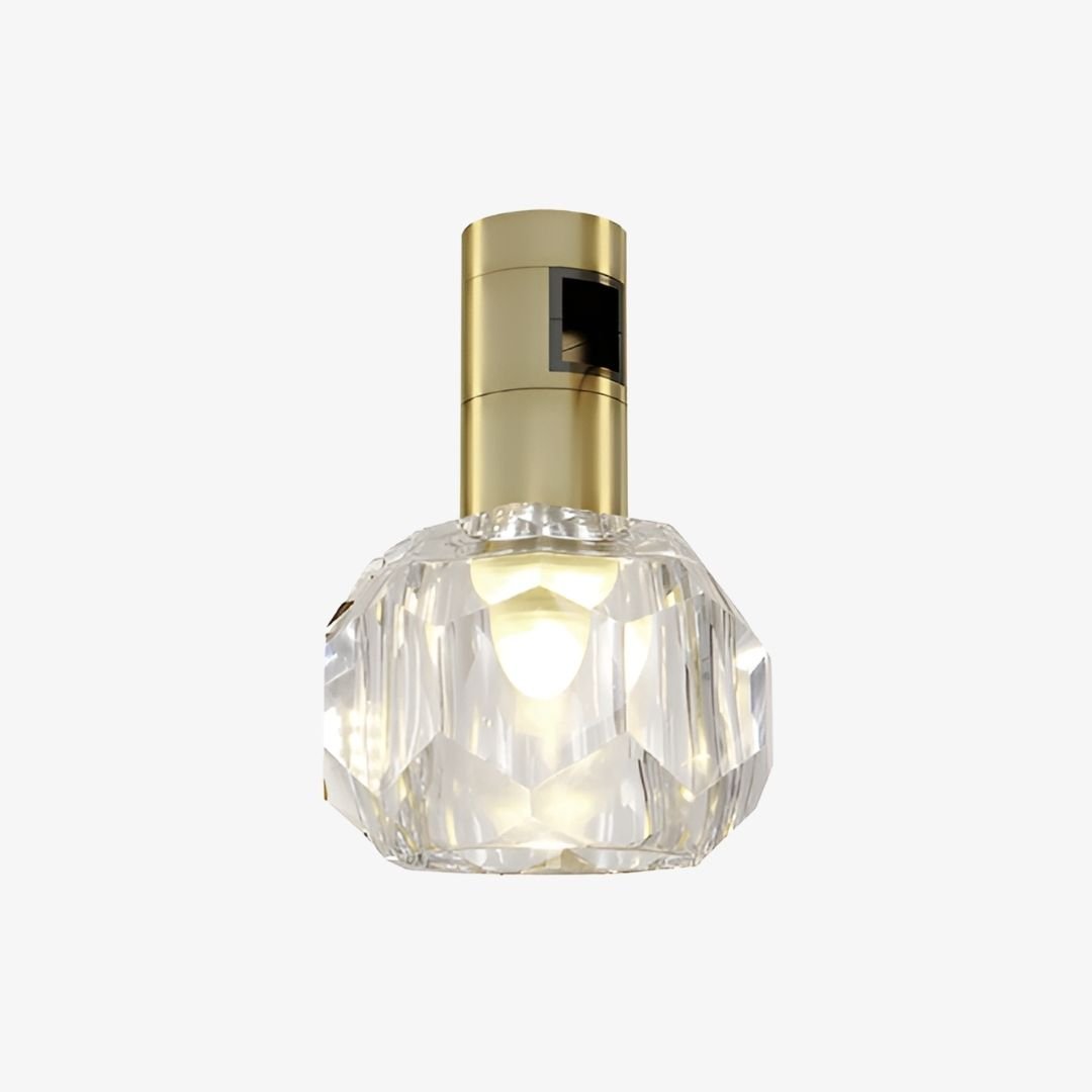 Jewel Magnetic Light with transparent faceted shade, illuminated centre and brass-gold 48V adapter
