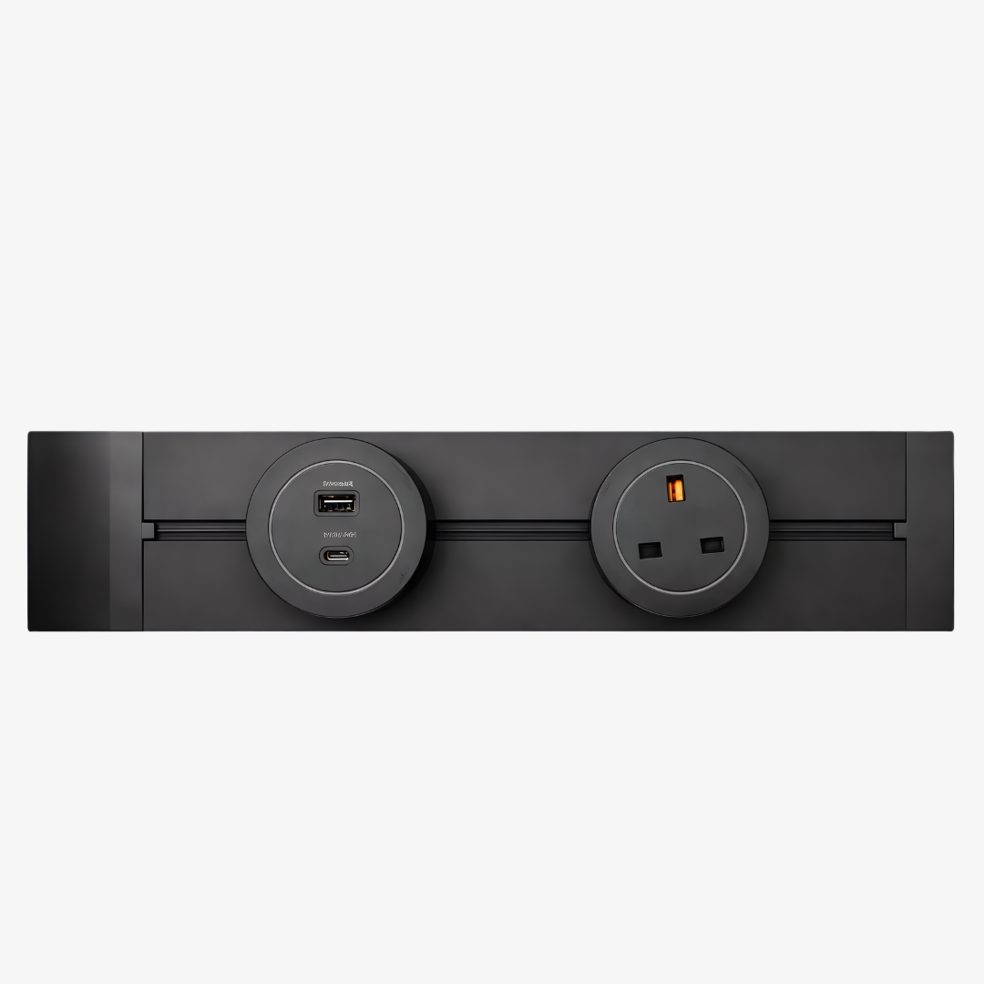 Power Track Socket with movable UK electrical outlet and USB charging module on a slim black r