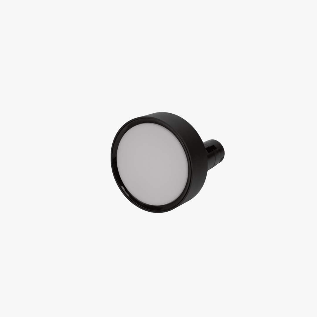 Magnetic round track light with opal diffuser and black housing for a 48V track system